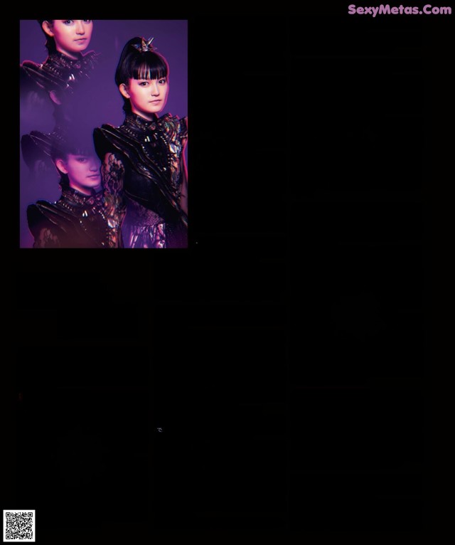 a magazine page with a picture of a woman in a black dress