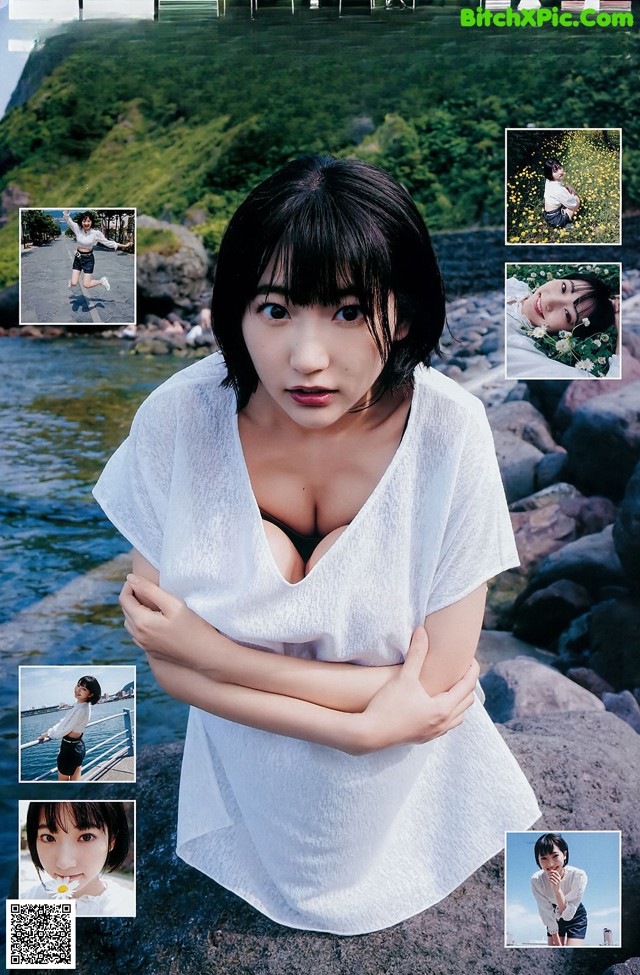 A woman in a white shirt is posing for a magazine cover.