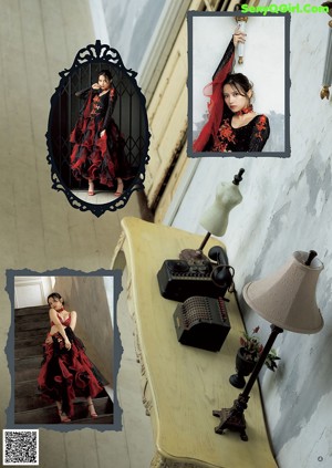A woman in a black and red dress posing for a picture.
