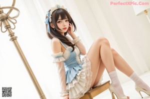 A woman in a blue and white dress and stockings.
