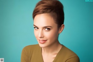 A woman sitting on top of a white couch next to a wall.